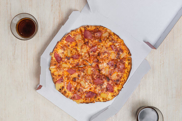 pizza in a cardboard box