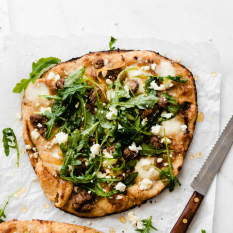 Grilled Lamb Pizzas with Feta, Arugula, and Honey